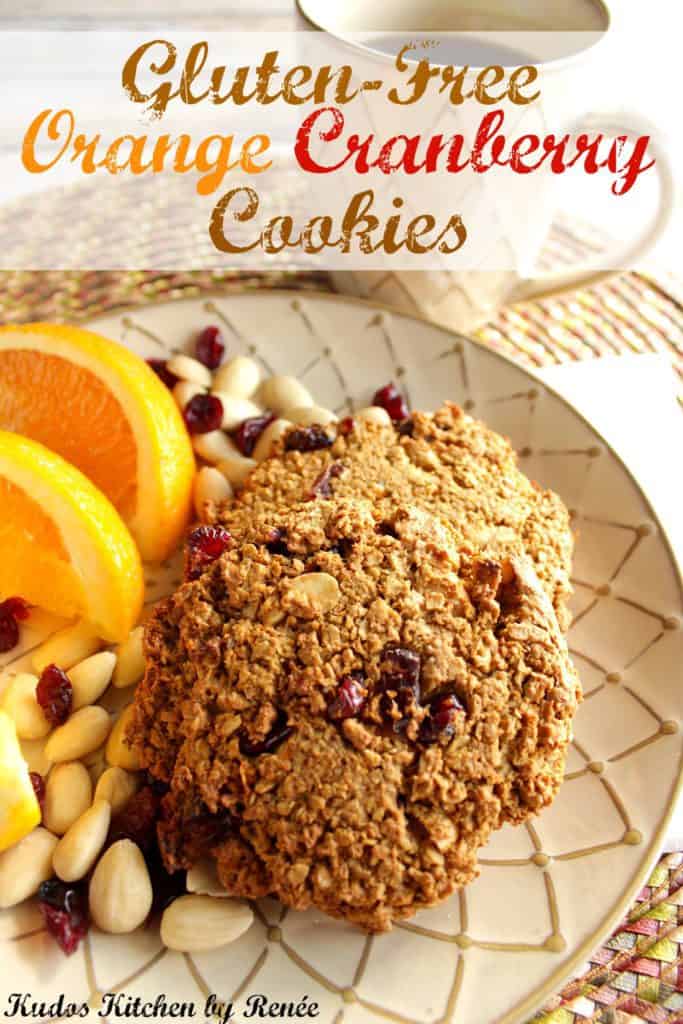 Vertical title text photo of gluten-free breakfast cookies on a plate the oranges and almonds.
