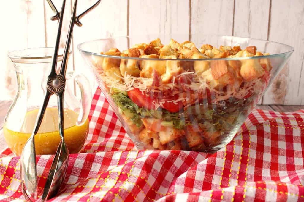I'm not going to lie to you here. The thing that really puts this BLT Layered Salad over the top are the homemade croutons! Well, those and the bacon of course! - www.kudoskitchenbyrenee.com BLT Layered Salad