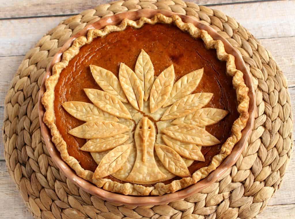 Overhead photo of a turkey crust pumpkin pie.