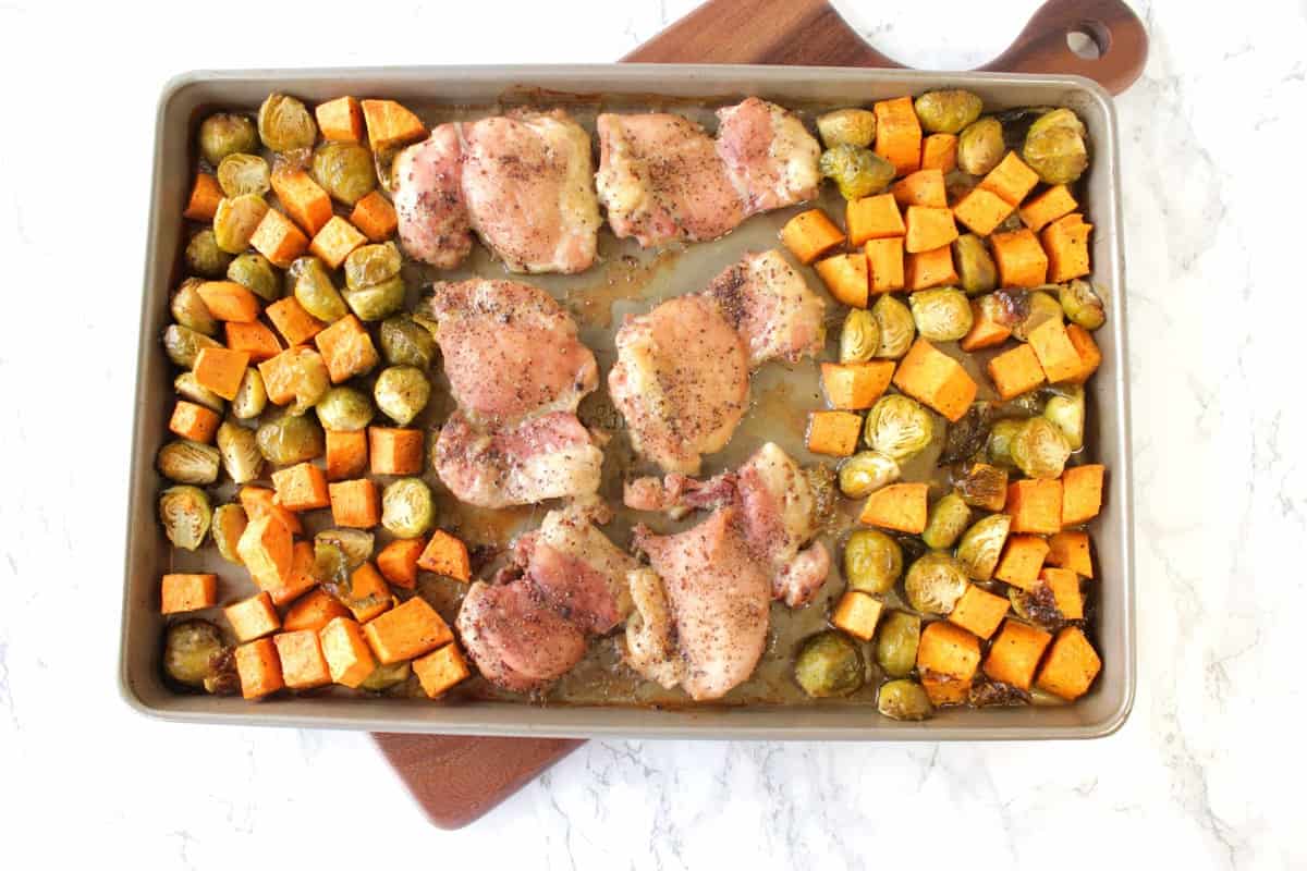 When dinner is this delicious, and the cleanup can be done in a blink of an eye, there's no reason not to make this Easy Maple Mustard Chicken Thigh Sheet Pan Supper, tonight! - Kudos Kitchen by Renee - www.kudoskitchenbyrenee.com Sheet Pan Supper with Chicken
