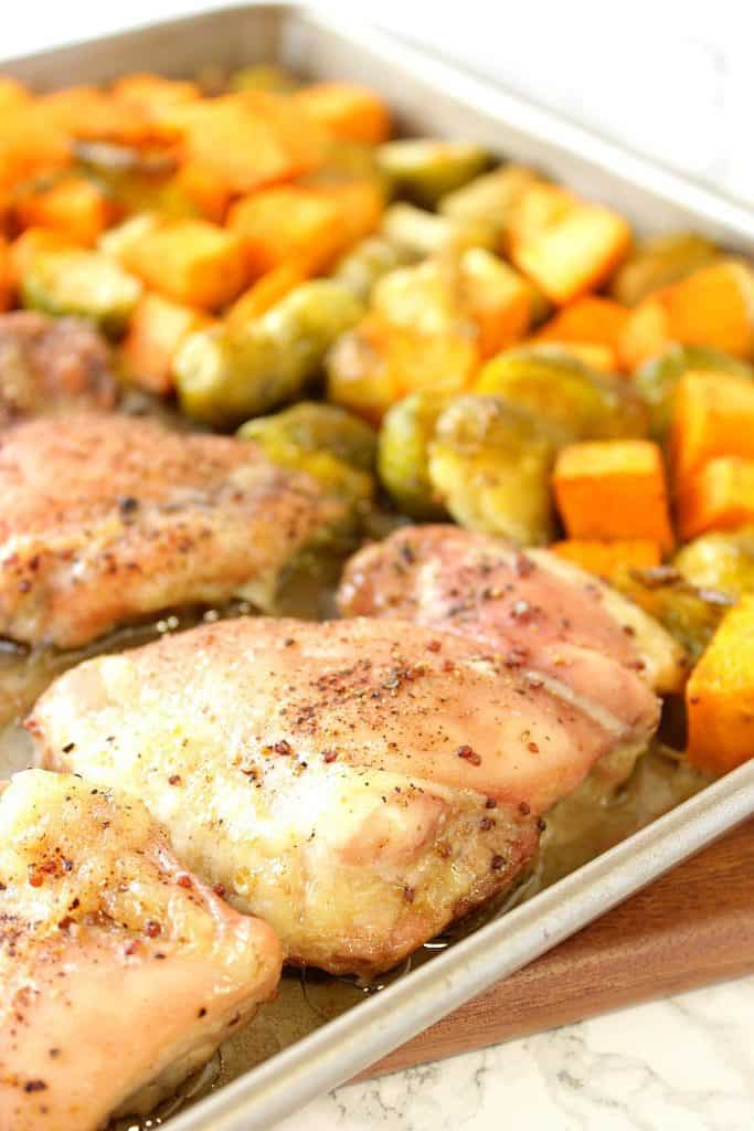 When dinner is this delicious, and the cleanup can be done in a blink of an eye, there's no reason not to make this Easy Maple Mustard Chicken Thigh Sheet Pan Supper, tonight! - Kudos Kitchen by Renee - kudoskitchenbyrenee.com Easy Maple Mustard Chicken Thigh Sheet Pan Supper
