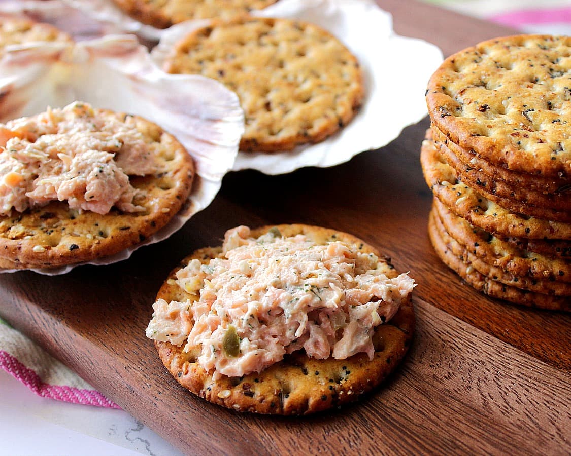 What I love most about this Baked Salmon Salad is that the flavor isn't too fishy tasting, which for me can sometimes be a turnoff. The mild fish flavor is balanced nicely with bright, fresh lemon zest, dried dill weed, and a touch of sweet pickle relish. - kudoskitchenbyrenee.com Baked Salmon Salad Spread Appetizer