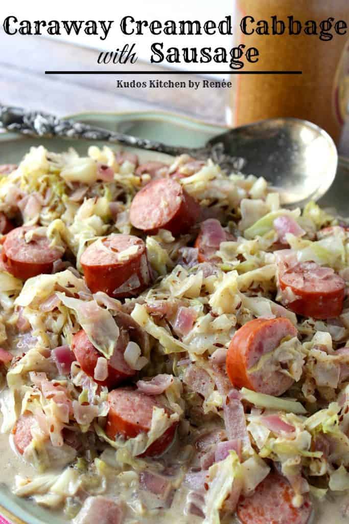 Vertical title text closeup image of creamed cabbage with caraway and sausage.