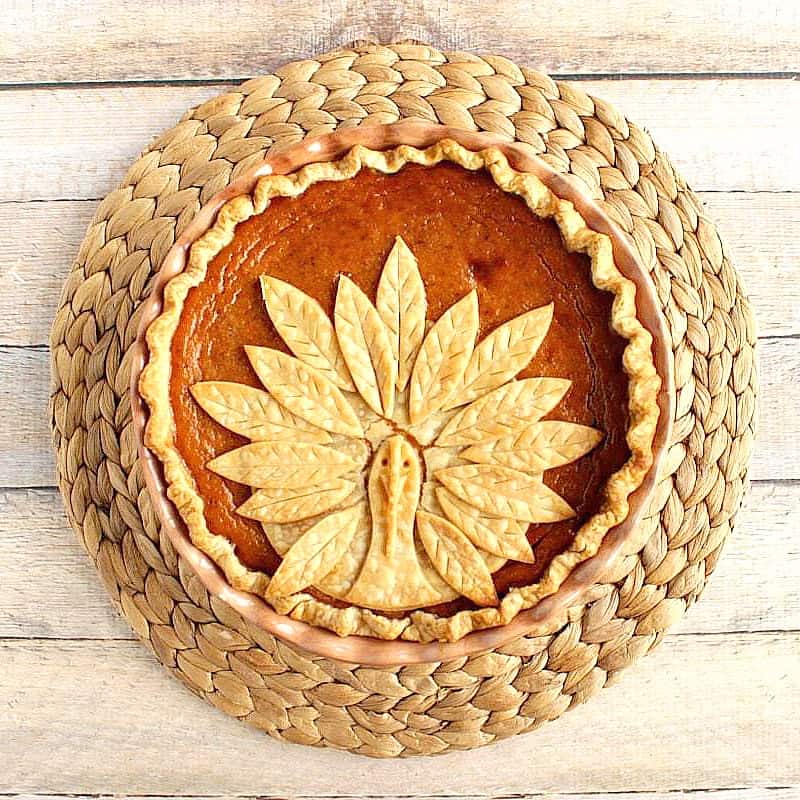 Overhead picture of turkey crust on a pumpkin pie