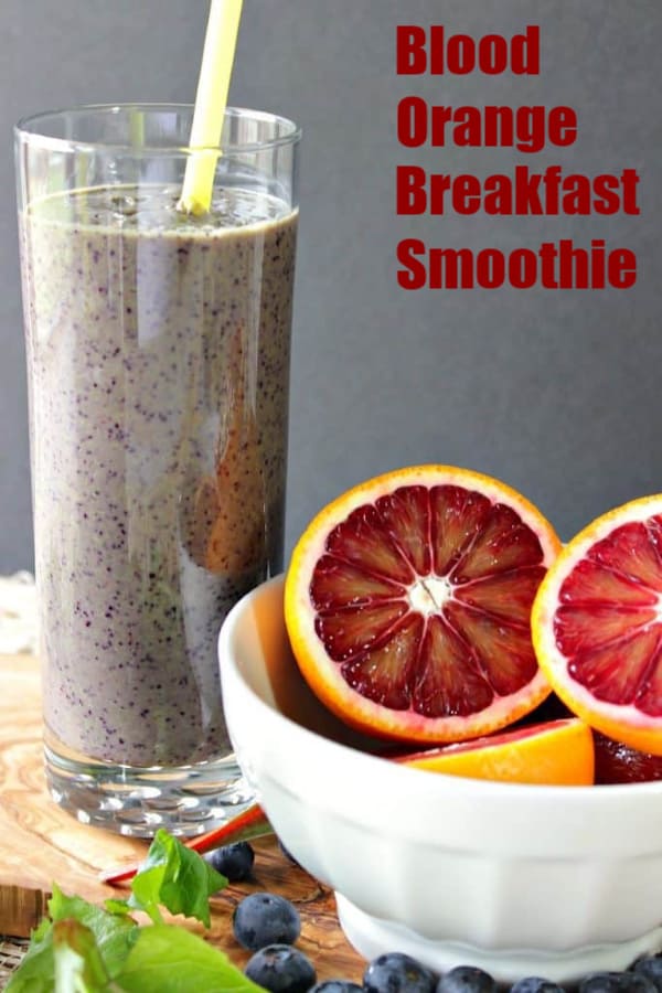 Blood orange smoothie in a glass with title text in upper right hand corner