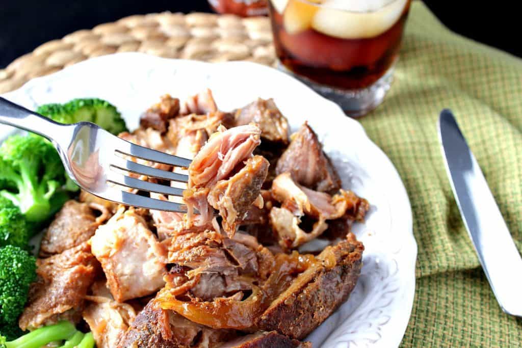 Root Beer Country Ribs for the Slow Cooker on a white plate with broccoli.