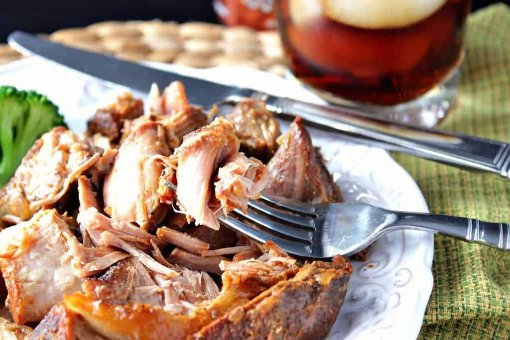 Root Beer Country Ribs for the Slow Cooker with a fork.