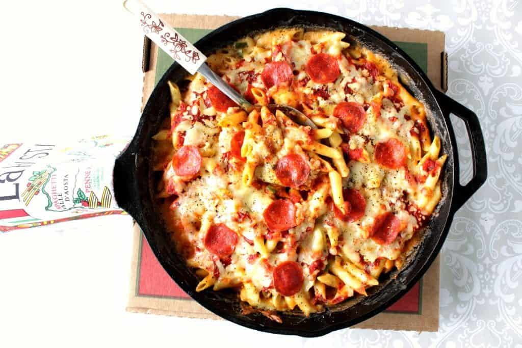 Overhead picture of Pepperoni Pizza Macaroni and Cheese in a cast iron skillet.