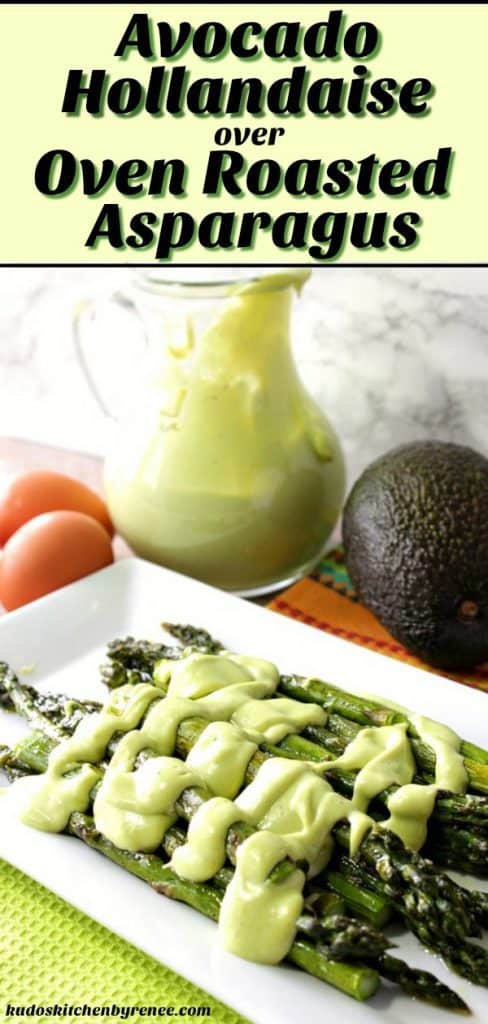A vertical closeup photo of a white plate with roasted asparagus with avocado hollandaise sauce.
