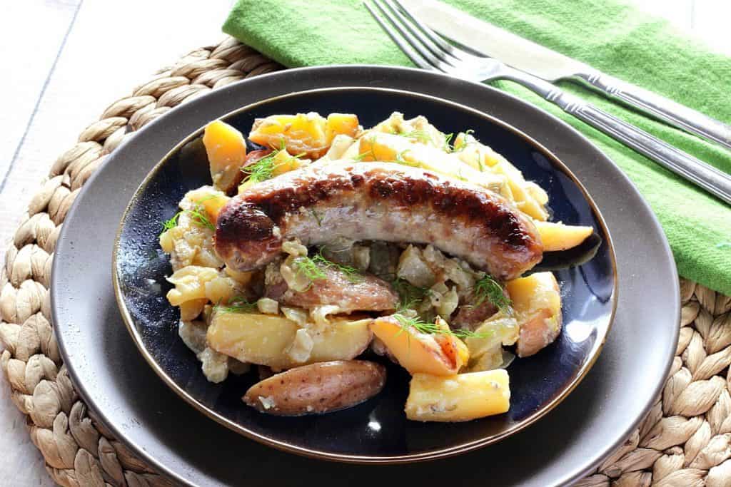 Italian Sausage, Fennel & Potato Dinner on a blue plate.