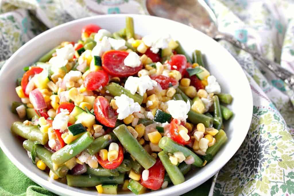 Farmer's market veggie salad with green beans, tomatoes, corn, and goat cheese.