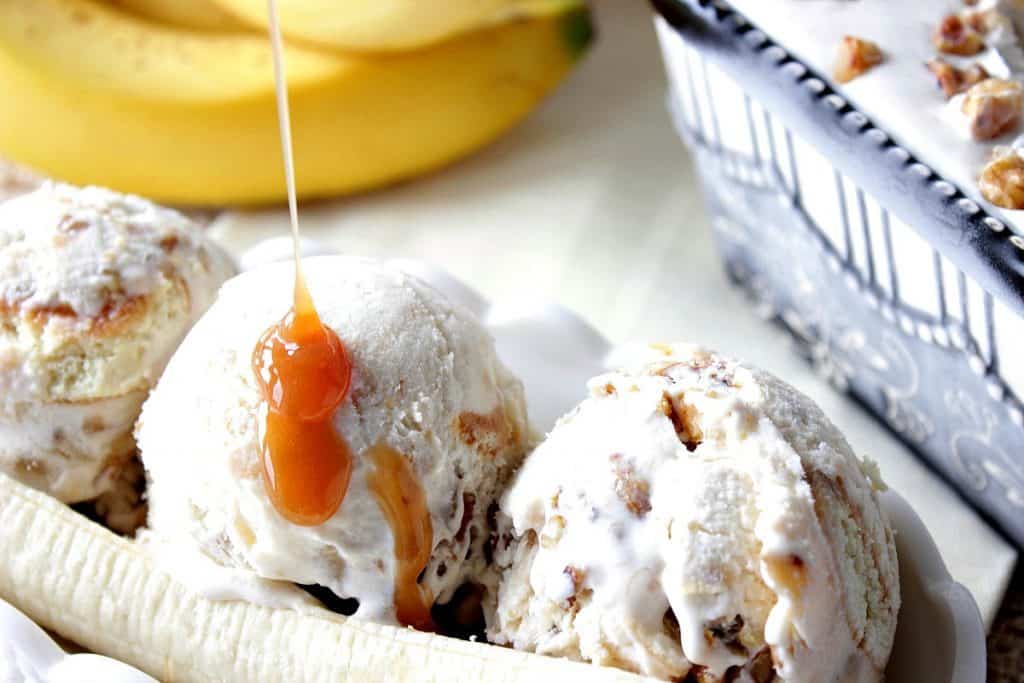 A drizzle of caramel sauce over banana walnut ice cream scoops.