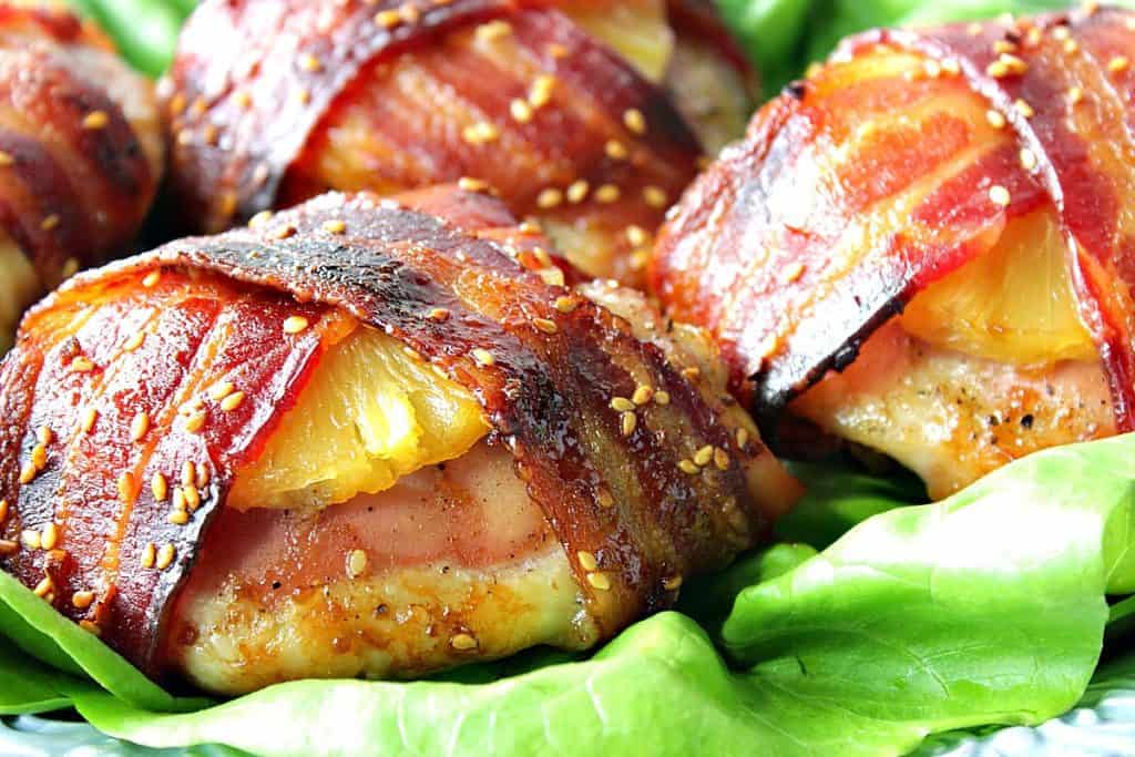 Beautifully caramelized Teriyaki Bacon Wrapped Pineapple Chicken Thighs with Sesame Seeds