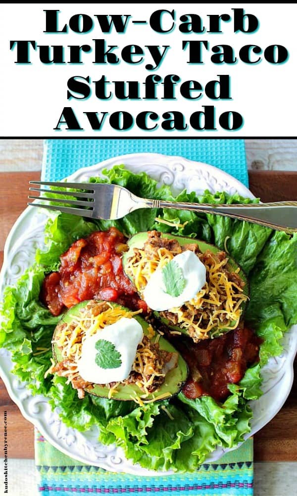 title text image of turkey taco stuffed avocados on a white plate with lettuce and salsa.