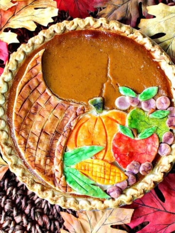 A colorful Cornucopia Pie with a painted crust.