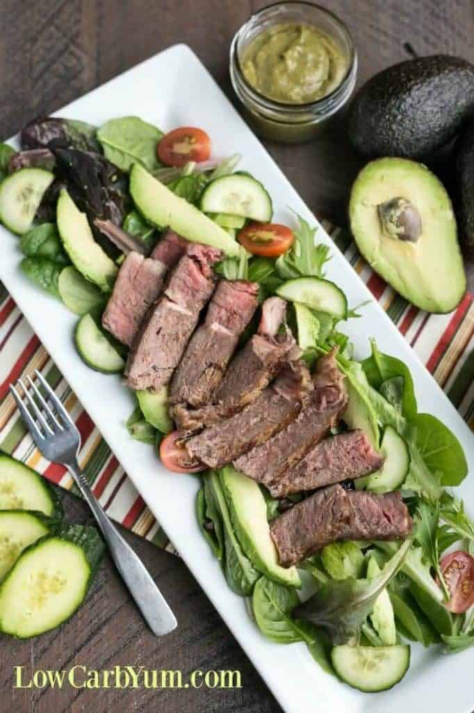 Overhead photo of steak and avocado salad for healthy salad recipe roundup.