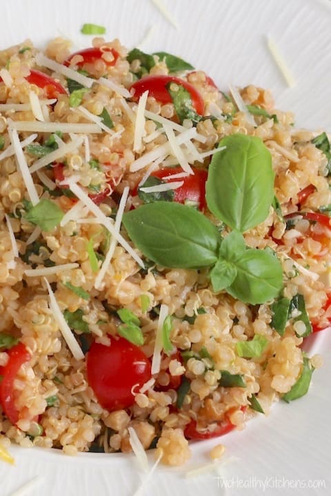 Quinoa salad photo with basil for healthy salad recipe roundup.