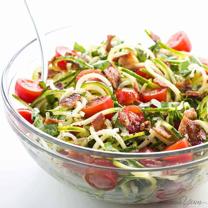 Zoodle salad with tomatoes for healthy salad recipe roundup.