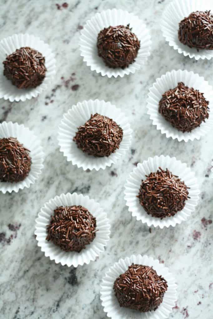 Several chocolate truffles in paper cups for Valentine's Day chocolate dessert recipes collection