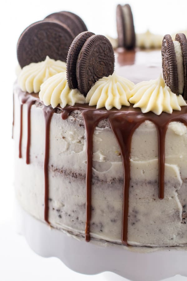 Closeup photo of a chocolate drip cake with oreo cookies for Best romantic chocolate dessert recipes for Valentine's day
