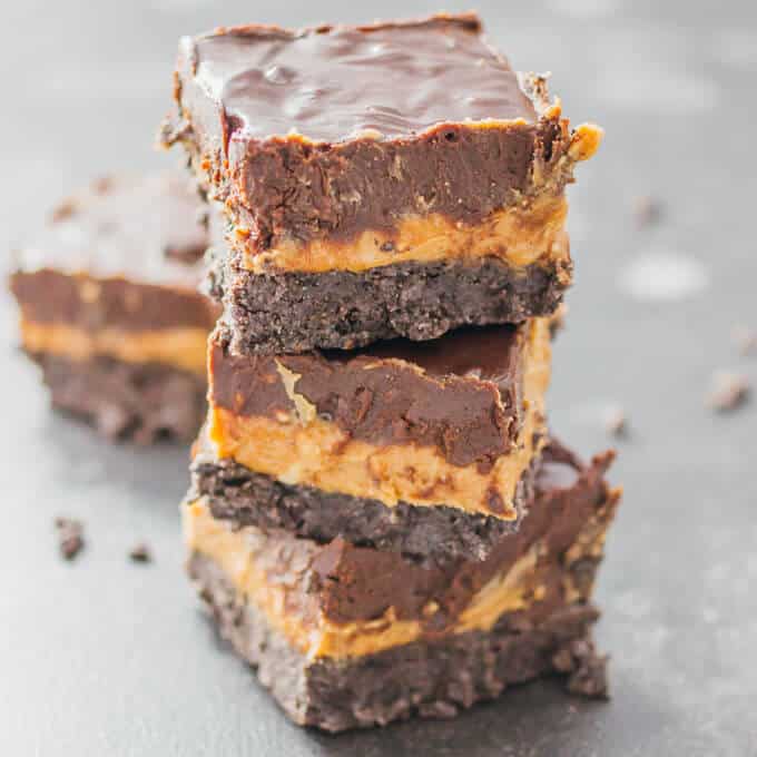 A stack of frosted brownies for Chocolate dessert recipes roundup