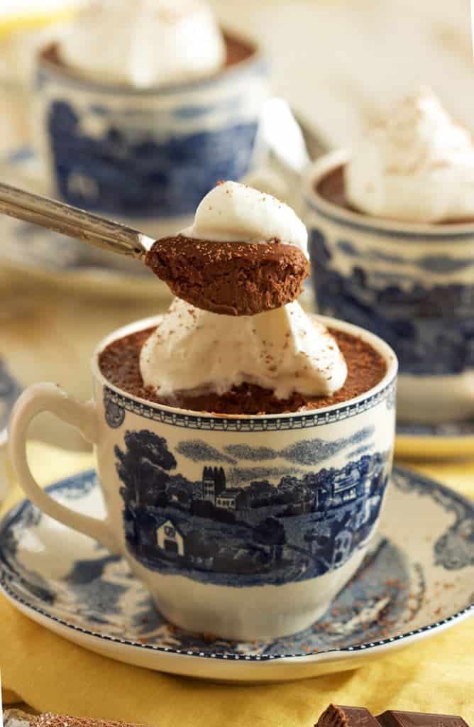 Closeup of a spoon of chocolate pudding for best romantic chocolate dessert recipes for a chocolate dessert roundup