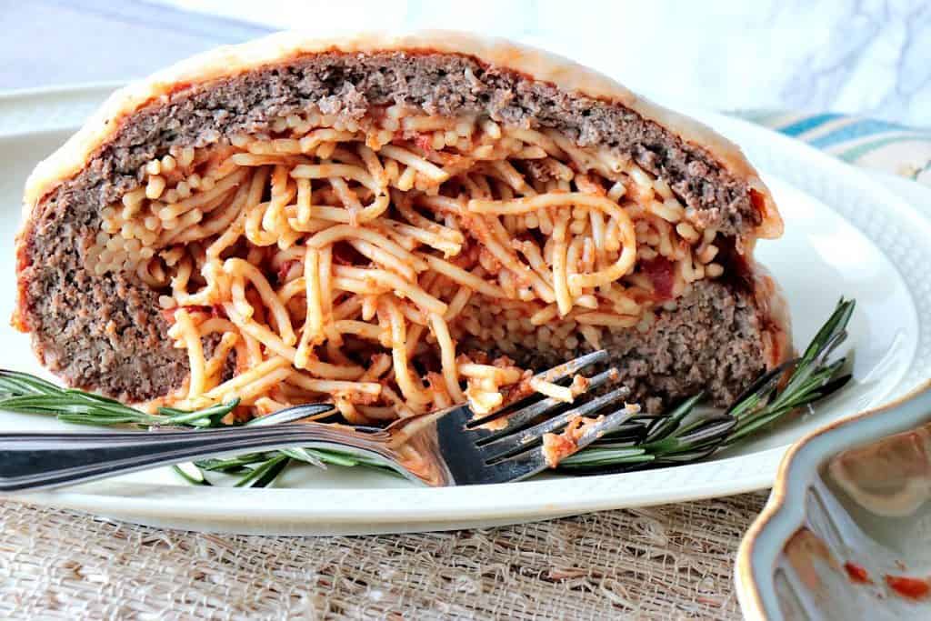 Spaghetti Stuffed Meatloaf with a Melted Cheese Topping - www.kudoskitchenbyrenee.com