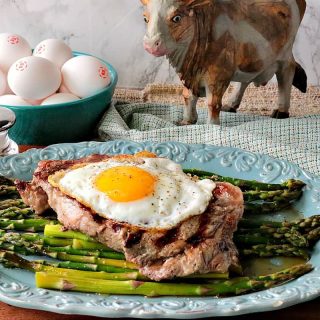 Buttery Rich Steak & Eggs Over Asparagus - www.kudoskitchenbyrenee.com