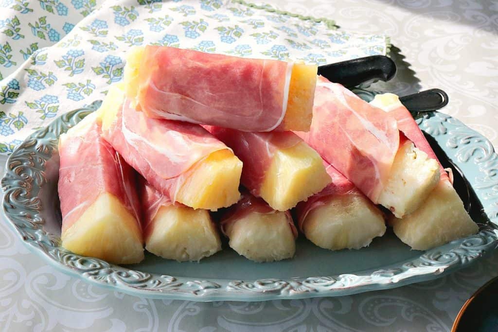 Start off your brunch feast for #BrunchWeek 2018 with the easy to prepare yet tantalizingly sweet & savory Prosciutto Wrapped Pineapple Spears. - www.kudoskitchenbyrenee.com Sweet & Savory Prosciutto Wrapped Pineapple Spears - www.kudoskitchenbyrenee.com