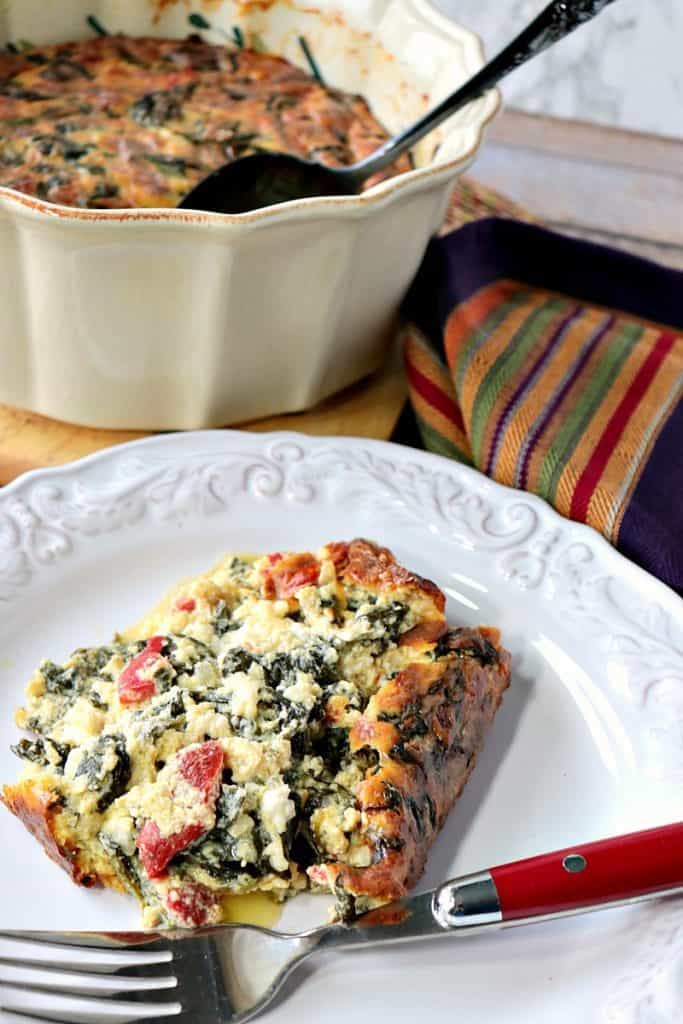 Keto Creamed Spinach Casserole with roasted red pepper and heavy cream. - www.kudoskitchenbyreneecom