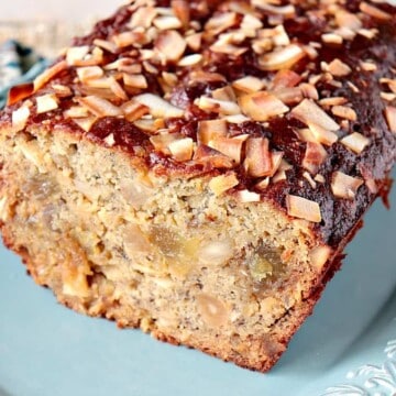 Gluten Free Tropical Banana Bread with Almond Flour, Macadamia Nuts, Pineapple, and Coconut Chips is utterly delicious! - kudoskitchenbyrenee.com