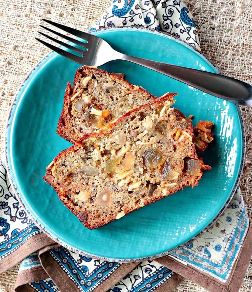 Gluten Free Tropical Banana Bread with Almond Flour, Macadamia Nuts, Pineapple, and Coconut Chips is utterly delicious! - kudoskitchenbyrenee.com