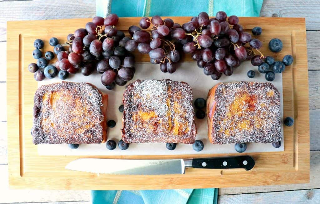 If you can't choose between sweet or savory when it comes to brunch, now you don't have to. This Sweet & Savory Blueberry Monte Cristo French Toast has something for everyone! - www.kudoskitchenbyrenee.com Sweet & Savory Blueberry Monte Cristo French Toast - www.kudoskitchenbyrenee.com