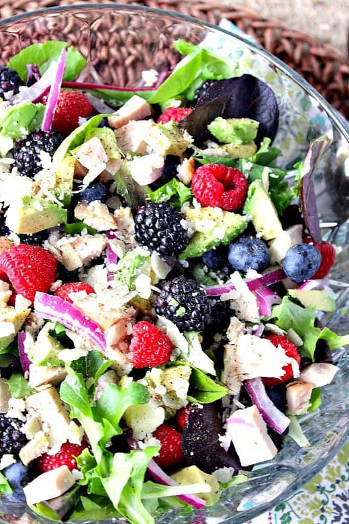 This Berry Delicious Chicken Avocado Salad is my very favorite salad. While I don't always add chicken, but I do always make my own vinaigrette. Today I'm sharing how to make my strawberry balsamic vinaigrette. It's a wonderfully fruity compliment to this tasty, healthy, and satisfying salad. - kudoskitchenbyrenee.com