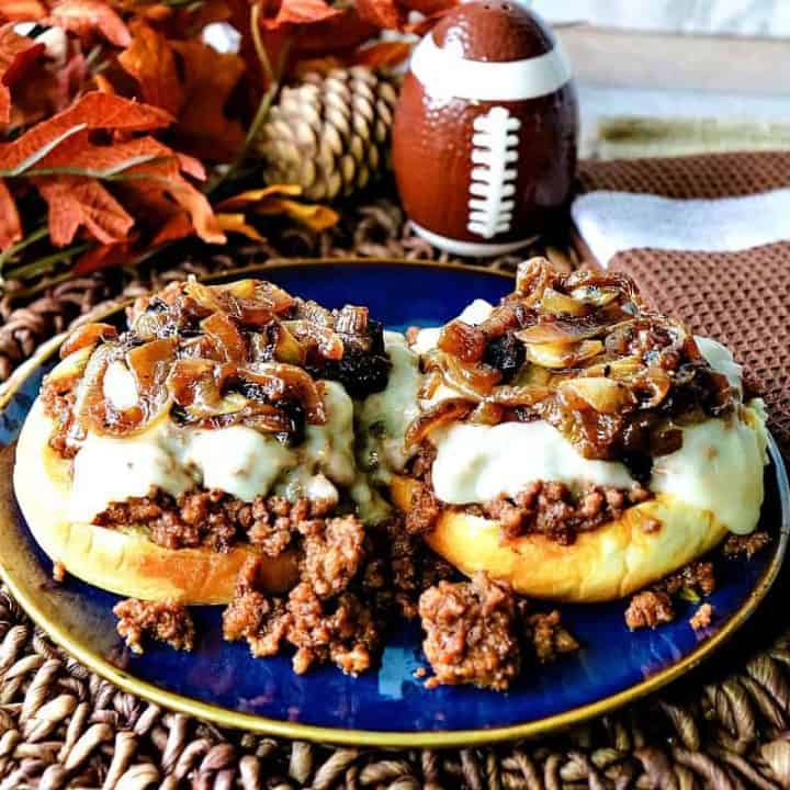 Open faced sloppy joes with cheese and caramelized onions.