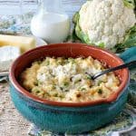 Cheesy Mashed Cauliflower Casserole is mixed with cream cheese, butter, cream, garlic and horseradish sauce for an extra zip of flavor! - kudoskitchenbyrenee.com