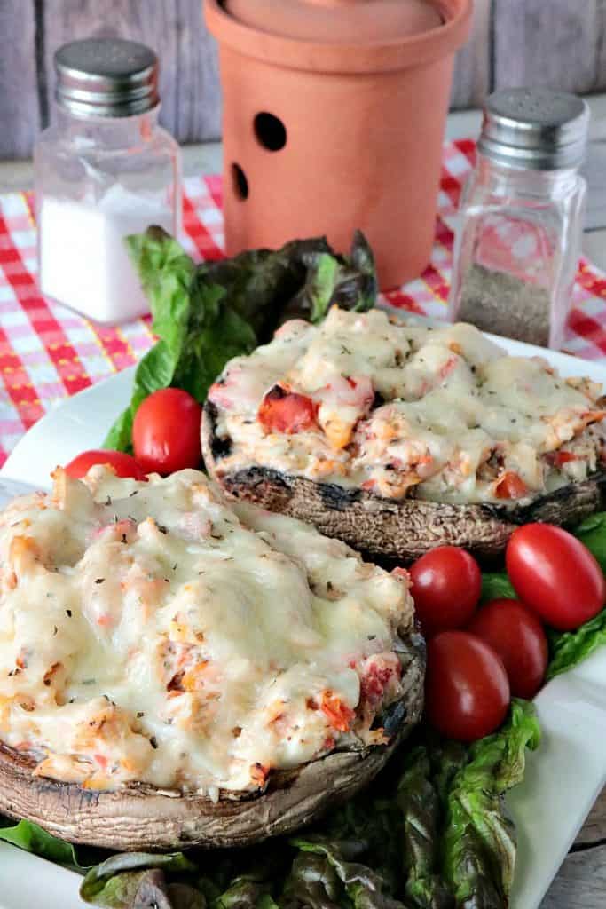 This original Kudos Kitchen recipe for Speedy Keto Chicken Parmesan Stuffed Portobello Mushrooms is my fast and speedy riff on a traditional Chicken Parmesan...with a twist. You're going to love it! - kudoskitchenbyrenee.com Speedy Keto Chicken Parmesan Stuffed Portobello Mushrooms - kudoskitchenbyrenee.com