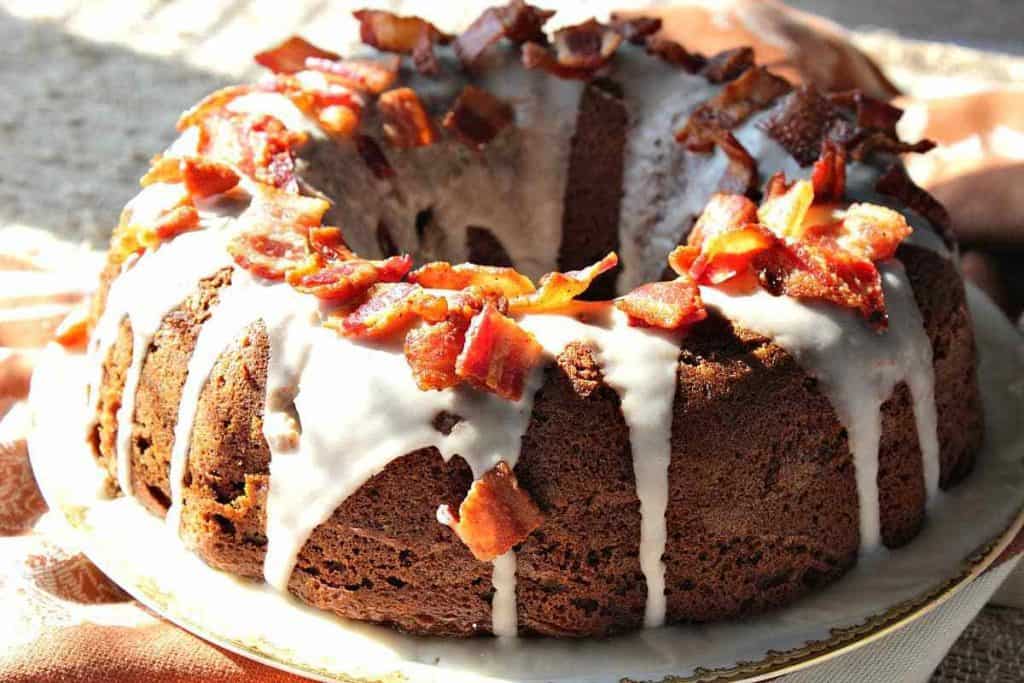 Bundt Cake with icing and bacon.