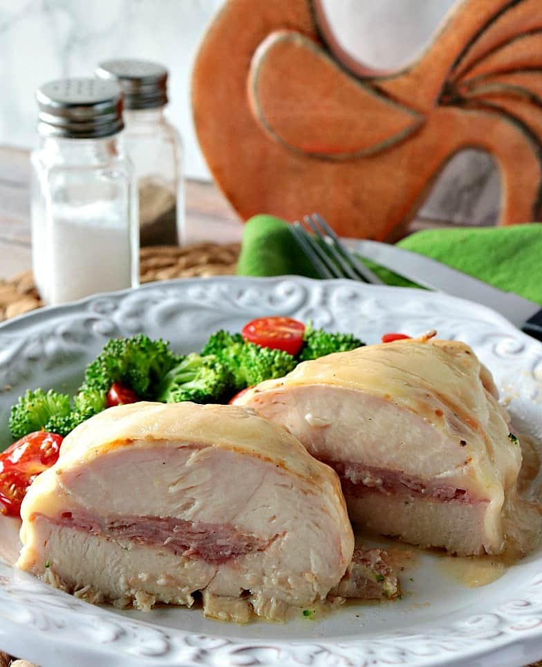 Gluten-Free Chicken Cordon Bleu Kudos Kitchen Style is a tender chicken breast stuffed with ham, Swiss cheese, and a kicky horseradish mayo sauce for extra flavor and pizzaz! - kudoskitchenbyrenee.com