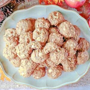 A platter of Apple Oatmeal Cookies with white chocolate and pecans.