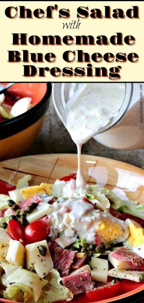 A closeup photo of blue cheese dressing being poured over a chef's salad with hard boiled eggs, cheese, meal, and capers.