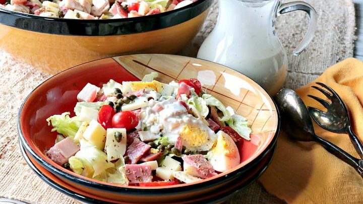 A bowl filled with a homemade Chef's Salad with Blue Cheese Dressing.