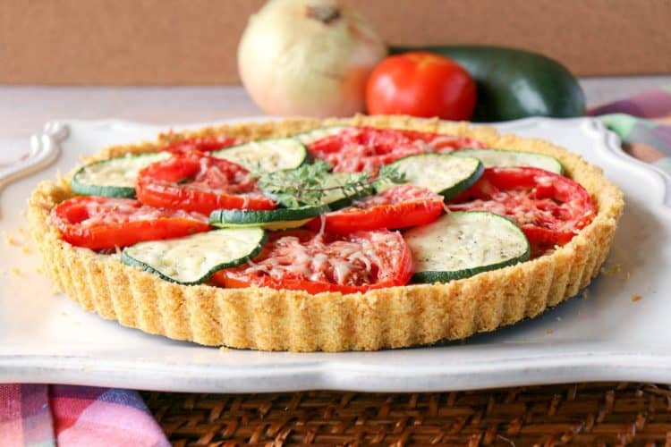 fresh tomato tart with zucchini & thyme infused caramelized onions