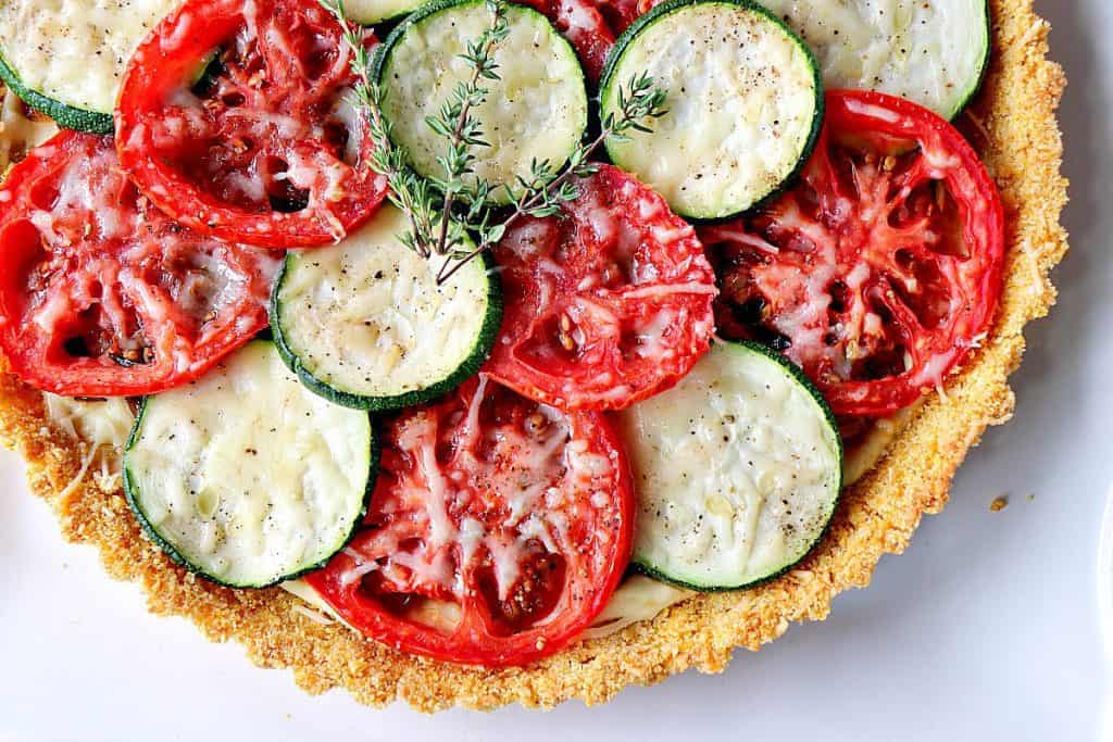 Fresh Tomato Tart with Zucchini & Caramelized Onions - kudoskitchenbyrenee.com