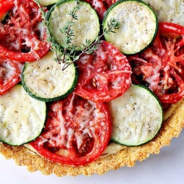 Fresh Tomato Tart with Zucchini & Caramelized Onions - kudoskitchenbyrenee.com