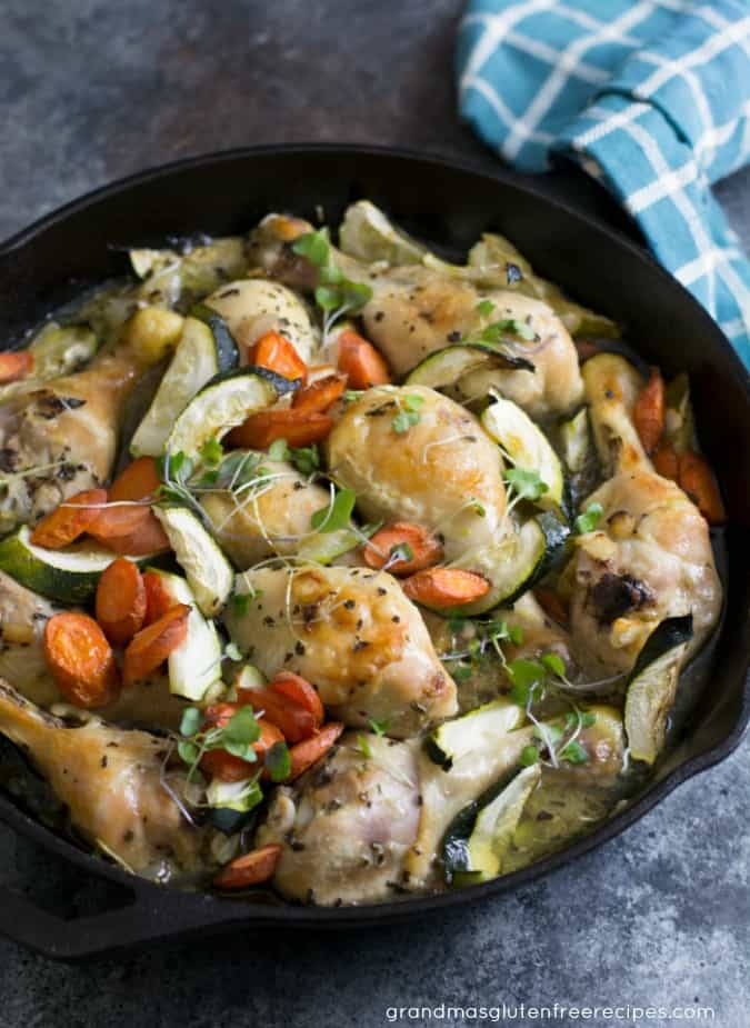Easy Weeknight Dinner Recipes. Chicken with vegetables in a cast iron skillet.