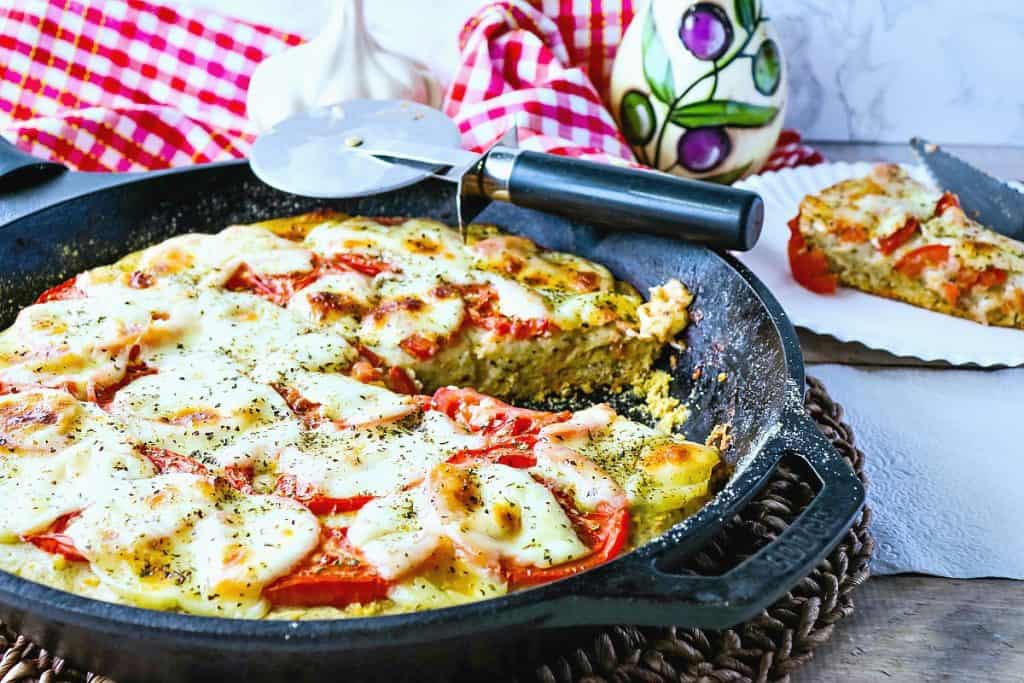 If you're a huge garlic lover (like we are), then you simply MUST try this Garlic Lovers Pizza! The crust is super simple to make and is the perfect thickness to hold at the garlicy, cheesy goodness this pizza possesses! - kudoskitchenbyrenee.com Garlic Lovers Pizza Recipe Kudos Kitchen Style - kudoskitchenbyrenee.com
