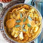 Easy Ravioli with Pumpkin Sausage Vodka Sauce is a proof positive that serving pumpkin for dinner is always a winner! - kudoskitchenbyrenee.com