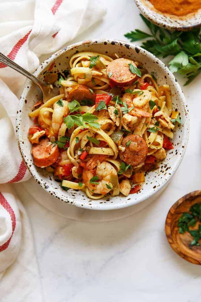 Easy Weeknight Dinner Recipes. Overhead photo of a bowl of noodles with sausage and shrimp.