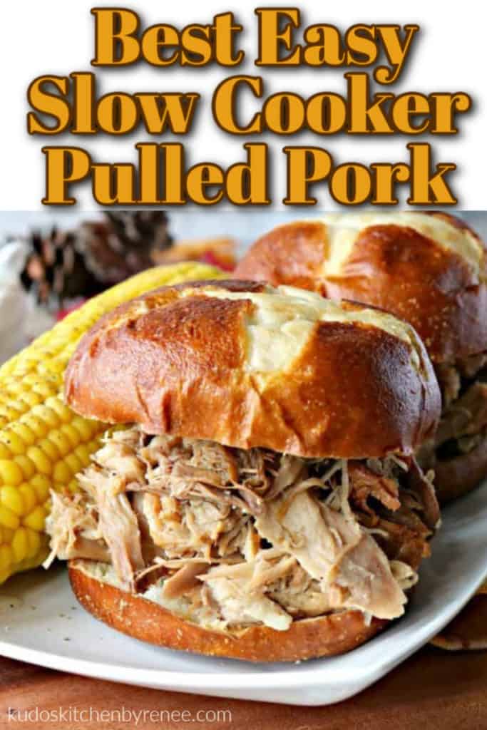 A closeup photo of a slow cooker pulled pork sandwich with title text graphic on a pretzel bun